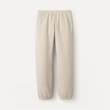 Beige UGG sweatpants on a white background. Available at Be Charmed. 