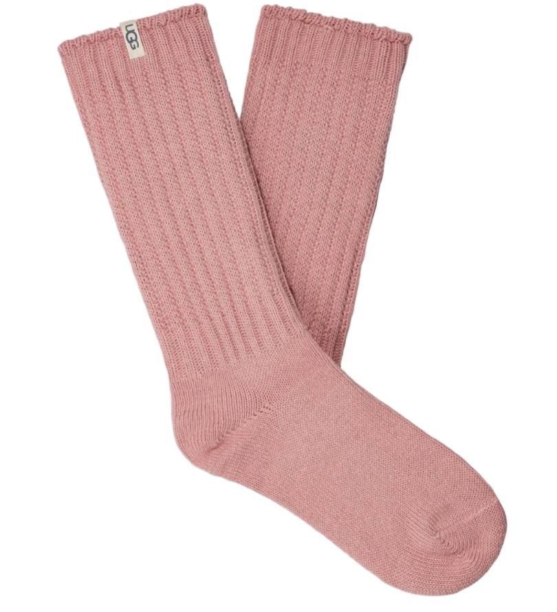 A pair of pink UGG women's slouchy crew socks with a ribbed texture. Available at Be Charmed. 