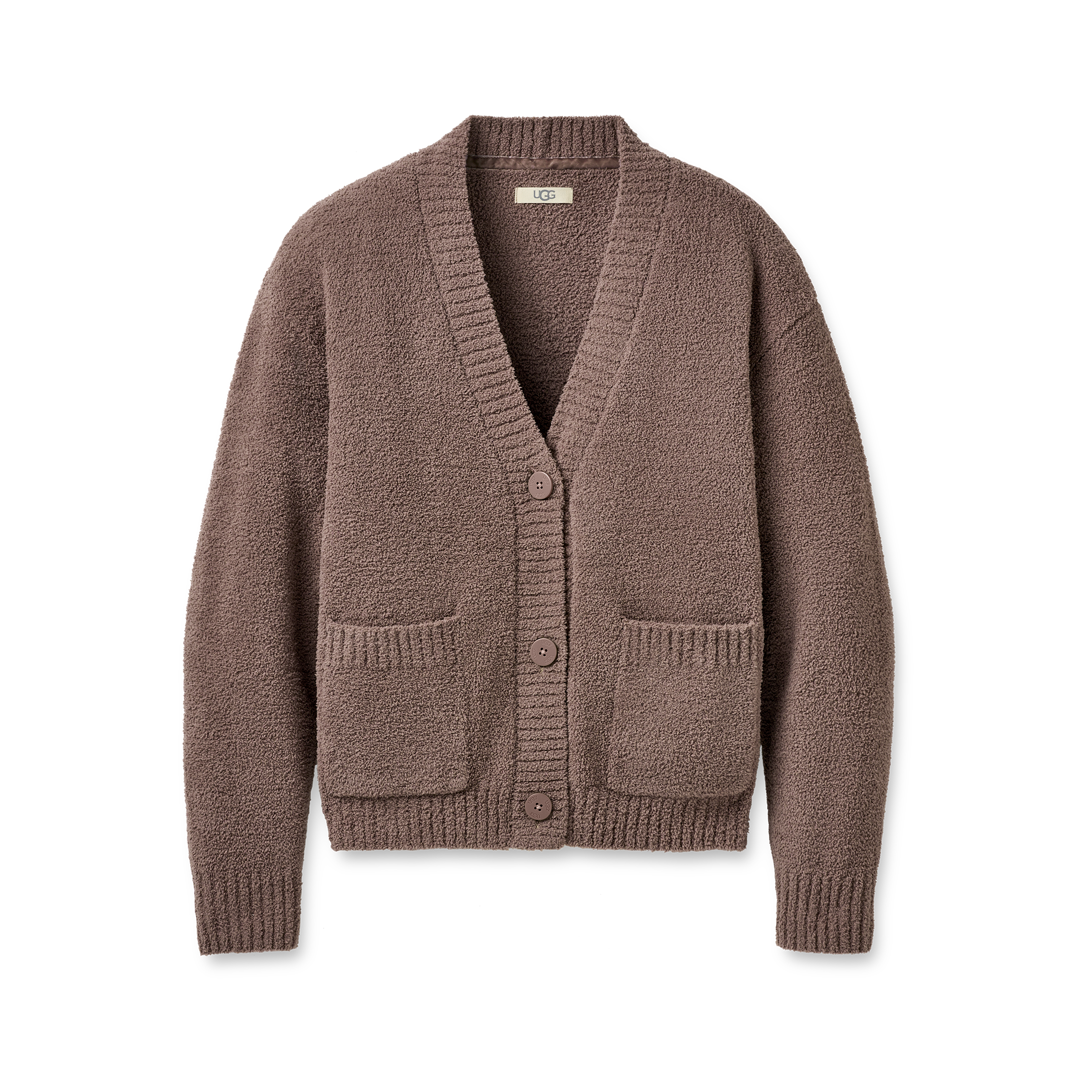 Brown cardigan with button details on a white background. Available at Be Charmed