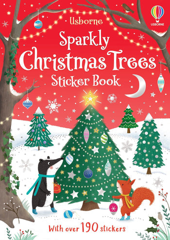Usborne Sparkly Christmas Trees Sticker Book cover with trees, animals, and festive decorations on a red background. Available at Be Charmed