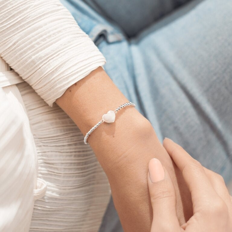 Marvelous Mom silver bracelet by A Littles & Co, silver-tone stretch charm bracelet. Available at Be Charmed.