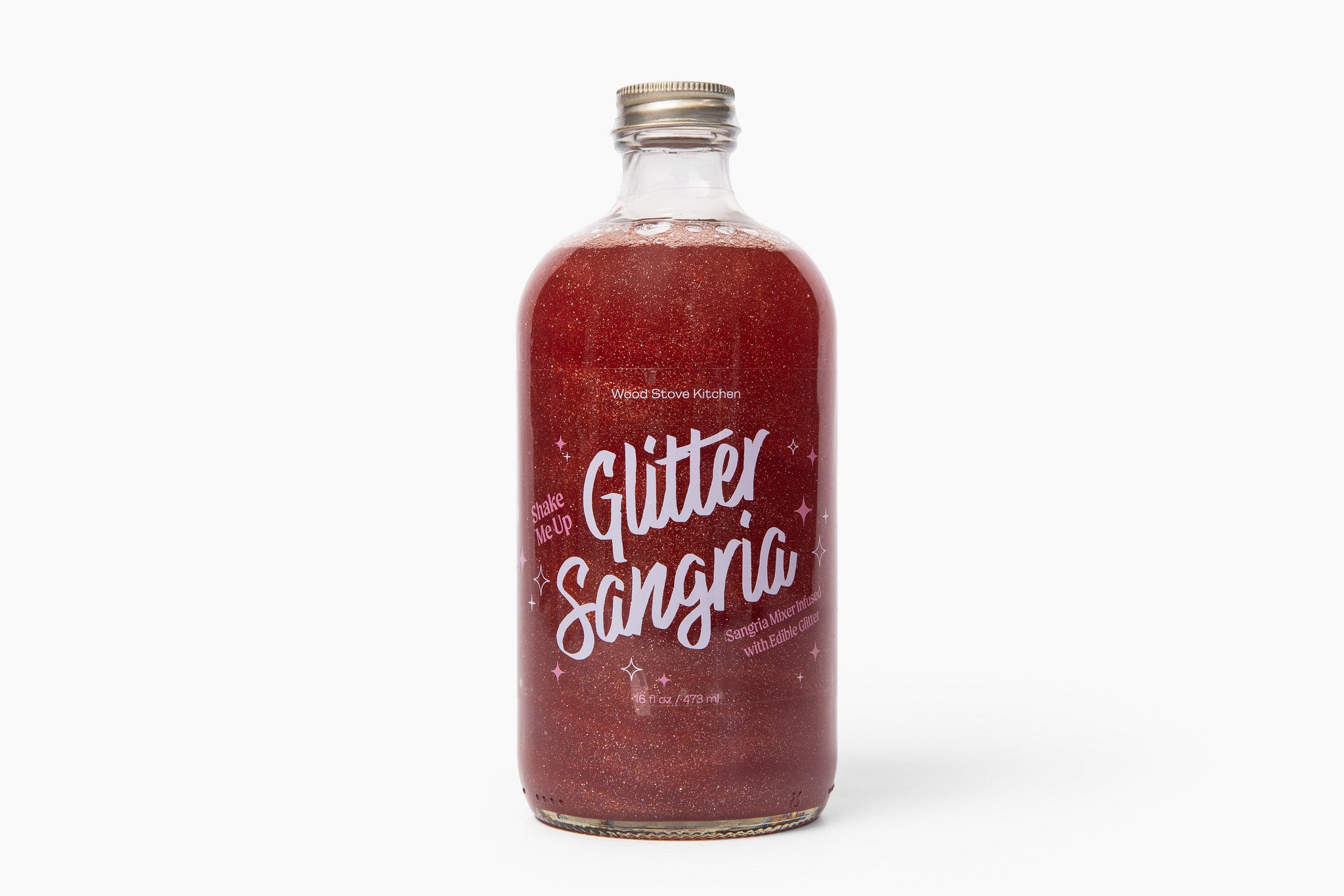 Bottle of Wood Stove Kitchen 'Glitter Sangria' on a white background. Available at Be Charmed