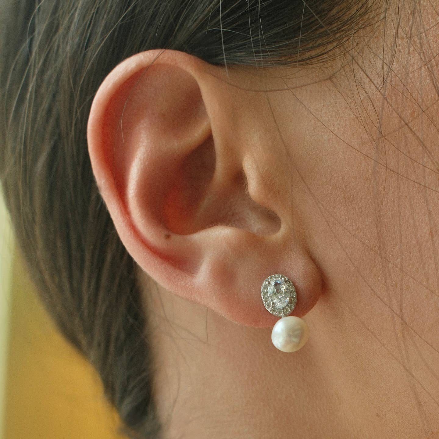 Woman wearing FYB Portia Pearl Earrings - Available at Be Charmed