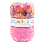 Pink container with 'Young & Wild' text and colorful sprinkles on a white background. Available at Be Charmed