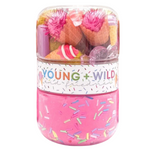 Pink container with 'Young & Wild' text and colorful sprinkles on a white background. Available at Be Charmed