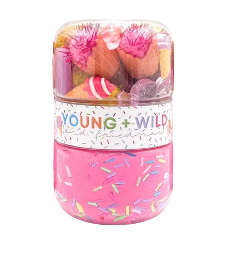 Pink container with 'Young & Wild' text and colorful sprinkles on a white background. Available at Be Charmed