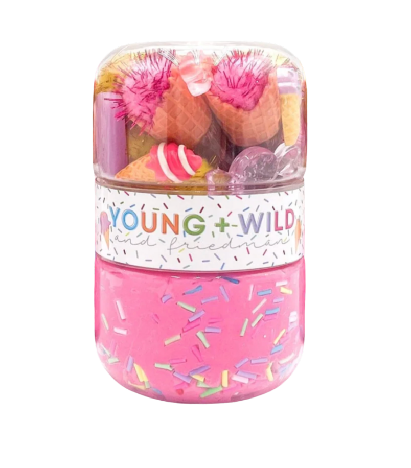 Pink container with 'Young & Wild' text and colorful sprinkles on a white background. Available at Be Charmed