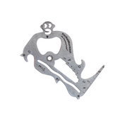 A multi-functional stainless steel PocketMonkey tool with various measurement scales and opening mechanisms, displayed on a plain background. Available at Be Charmed