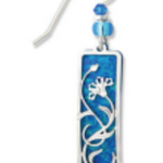 Adajio blue pendant earring with floral design on a white background. Available at Be Charmed