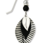 Adajio black and white feather-shaped earrings on a white background. Available at Be Charmed. 