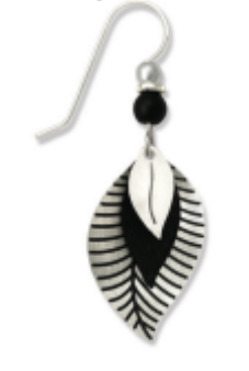 Adajio black and white feather-shaped earrings on a white background. Available at Be Charmed. 