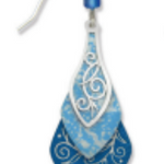 Adajio blue and silver earring on a white background. Available at Be Charmed. 