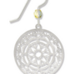 Adajio silver earring with intricate mandala design on a white background. Available at Be Charmed. 