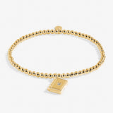 A Littles & Co Gold New Chapter Bracelet 
