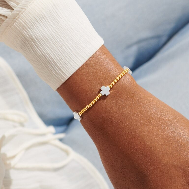 Woman Wearing A Littles & Co Silver and Gold Faith Hope Courage Bracelet