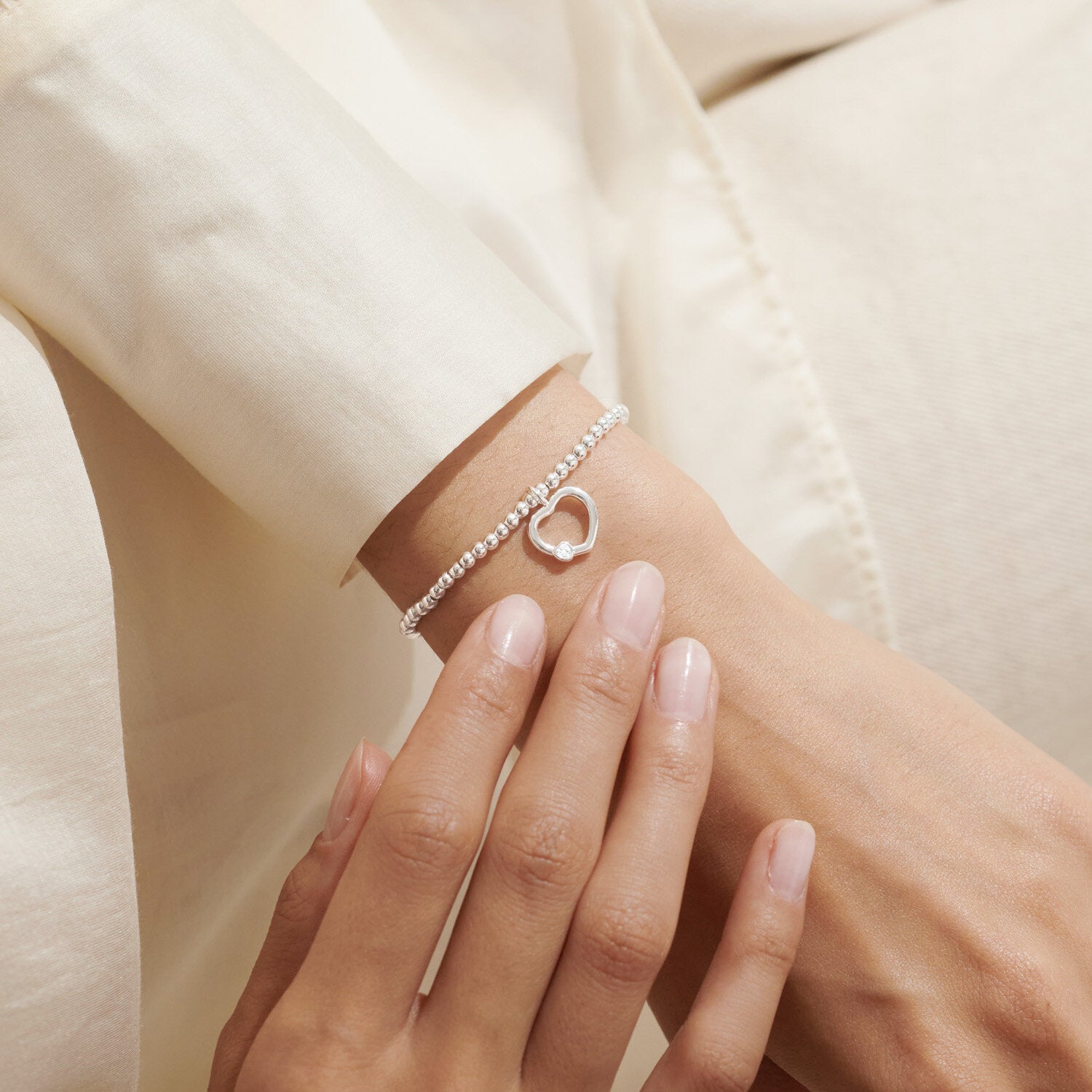 Woman Wearing A Littles & Co Silver Wonderful Grandma Bracelet