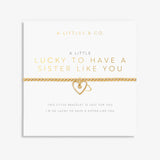 A Littles & Co Gold Lucky To Have A Sister Like You Bracelet on Card