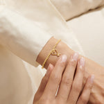 Woman Wearing A Littles & Co Gold Beautiful Wife Bracelet 