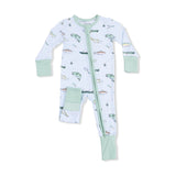 Baby romper with whale pattern on a white background. Available at Be Charmed