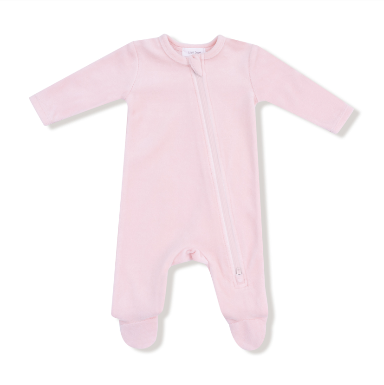 ngel Dear Velour Footie – Teddy Bear Pink Pink velour baby onesie with a zipper on a white background. Available at Be Charmed.