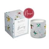 Annapolis Candle Kim Hovell First Flurry Boxed Candle – crisp seasonal scent with signature artwork. Available at Be Charmed.