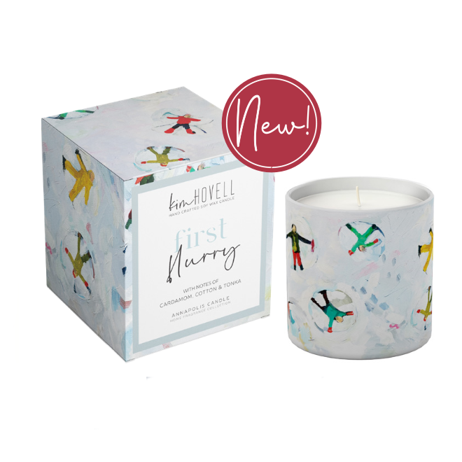 Annapolis Candle Kim Hovell First Flurry Boxed Candle – crisp seasonal scent with signature artwork. Available at Be Charmed.