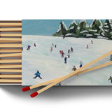 Annapolis Candle Kim Hovell Slope Side Boxed Matches – elegant match box with signature artwork. Available at Be Charmed.