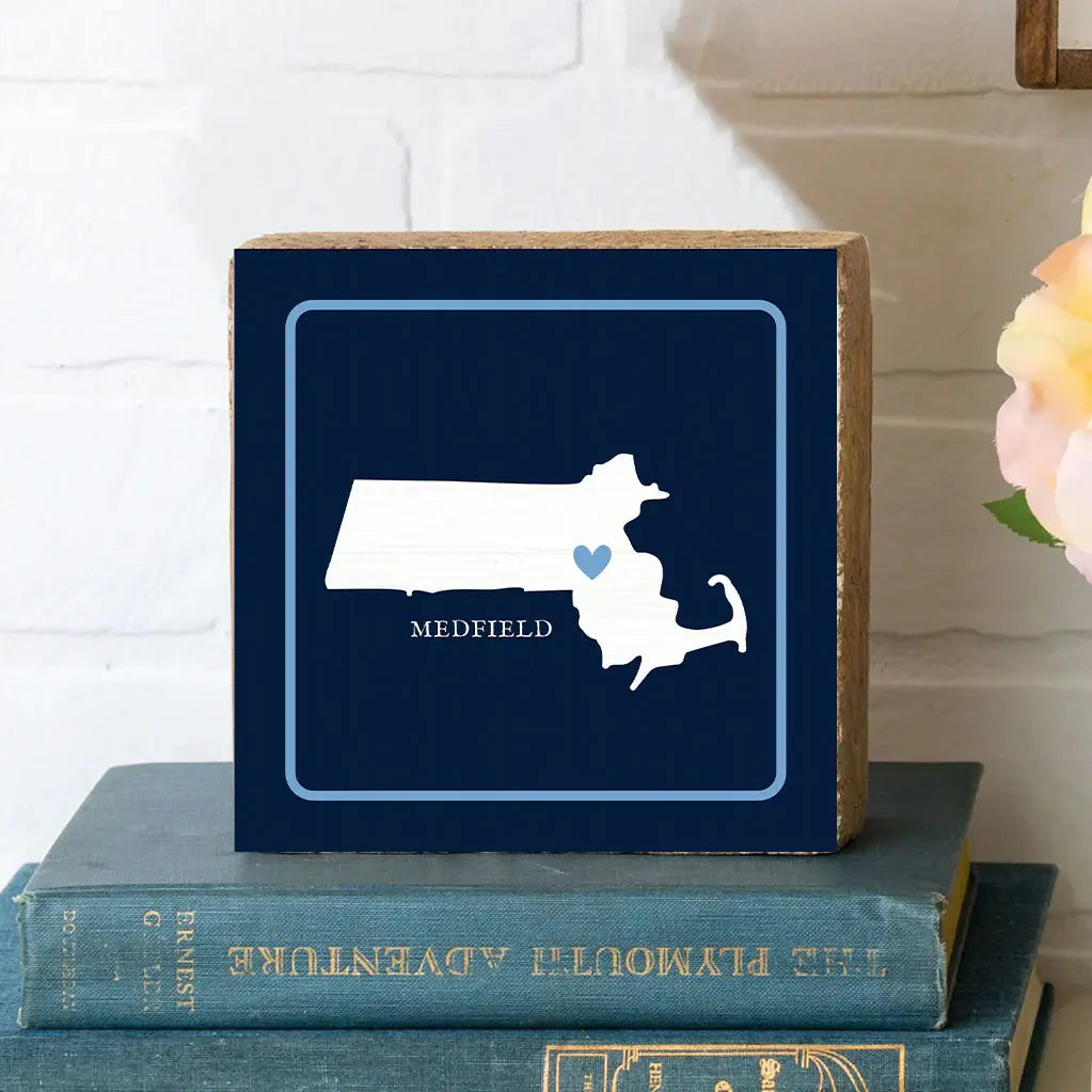 Rustic Marlin Medfield MA Silo 6 x 6 Block pictured sitting on books