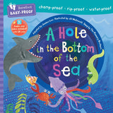 Book cover of 'A Hole in the Bottom of the Sea' with underwater illustrations and colorful text. Available at Be Charmed