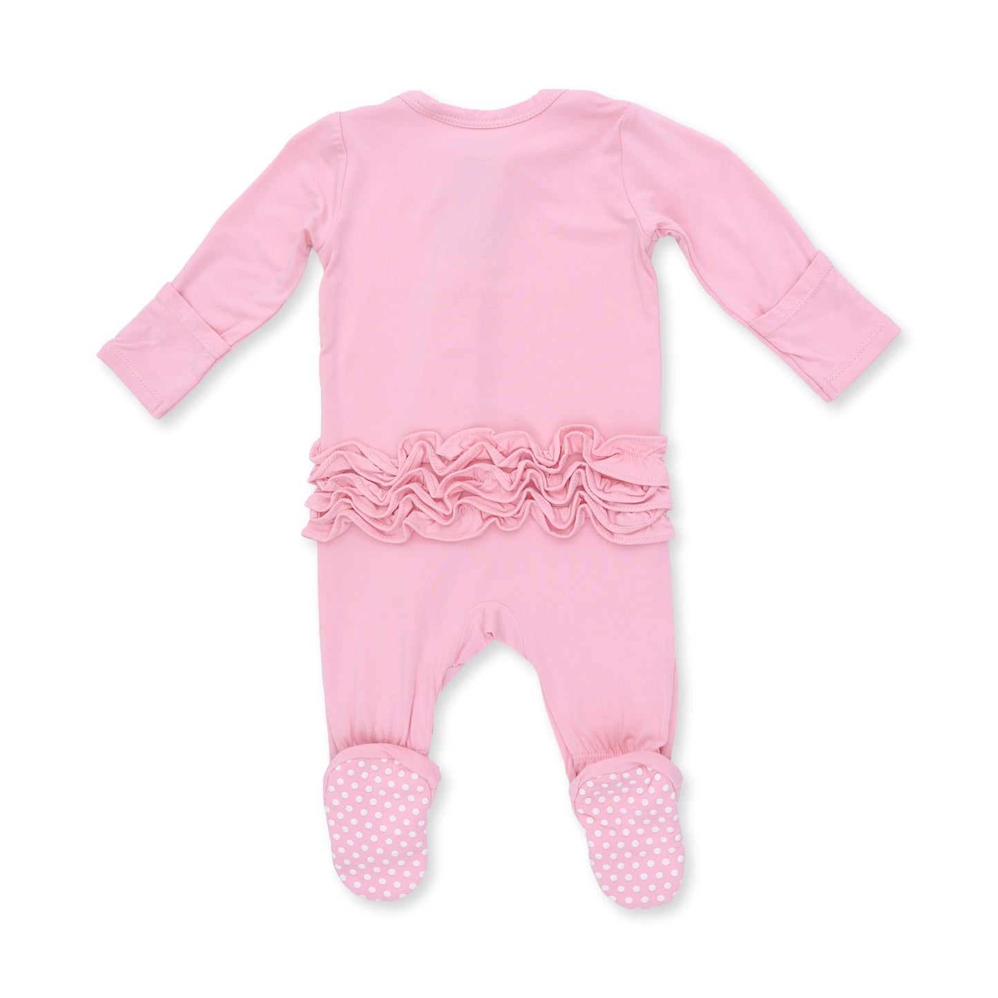 An Angel Dear candy pink long-sleeve footed sleeper with a ruffled waistband and white polka dot foot covers, shown from the back on a white background. Available at Be Charmed