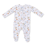 An Angel Dear baby long-sleeve footed sleeper in white with an all-over football-themed print in blue, orange, and beige, shown flat on a white background. Available at Be Charmed