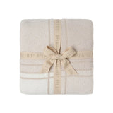 Folded Barefoot Dreams CozyChic Buffalo Plaid Throw in Stone Multi available at Be Charmed, showcasing a cozy checkered pattern and ultra-soft knit texture.