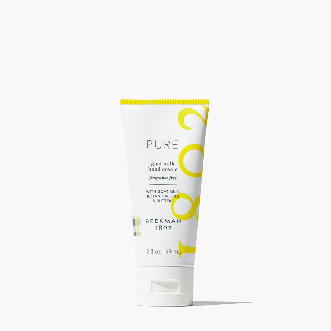 Tube of Beeckman 1802 Pure Goat Milk Hand Cream on a white background. Available at Be Charmed