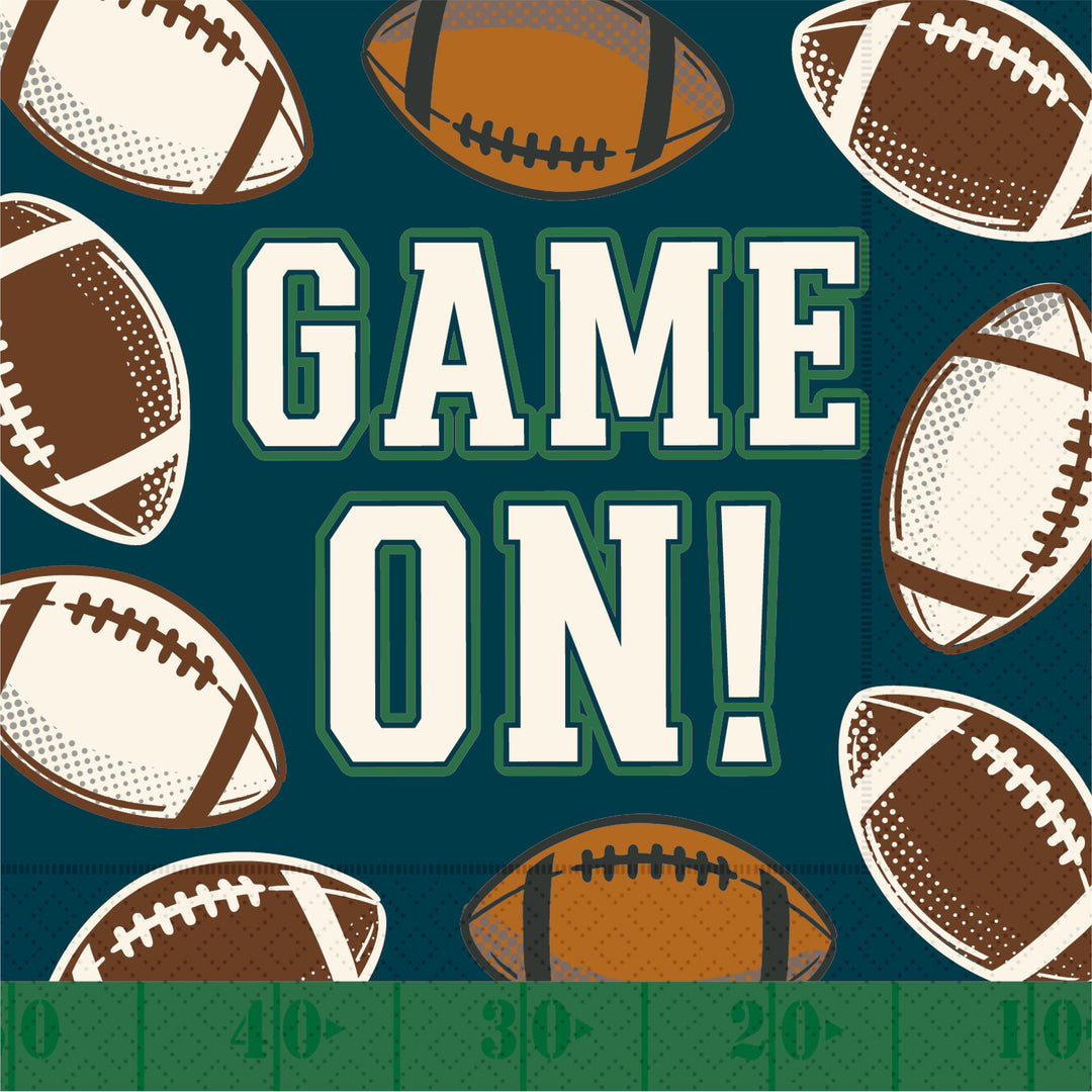 Pattern of footballs with 'GAME ON!' text on a Boston International fall Cocktail Napkin available at Be Charmed