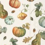 A boston international guest towel repeating autumn watercolor pattern featuring pumpkins, gourds, leaves, acorns, and small berries on a warm off-white background. Available at Be Charmed