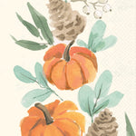 Boston International guest towel with Watercolor autumn floral pattern featuring three orange pumpkins, green leaves, pinecones, and small white berries on a textured off-white background. Available at Be Charmed