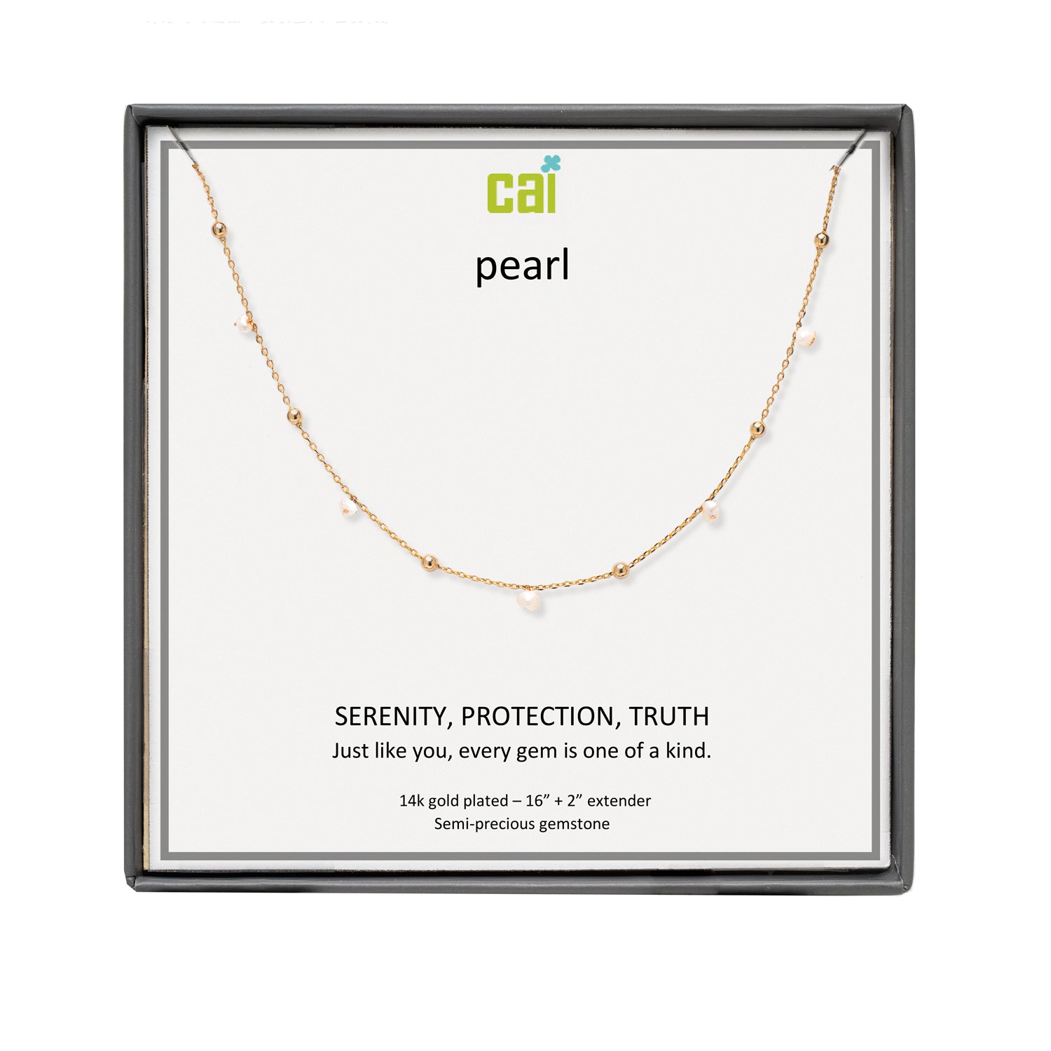A CAI gold-plated pearl necklace with a delicate chain and small spaced pearls, presented in a square black gift box on a white backing card. The card features the brand logo 'cai' and the word 'pearl' along with product details. Available at Be Charmed