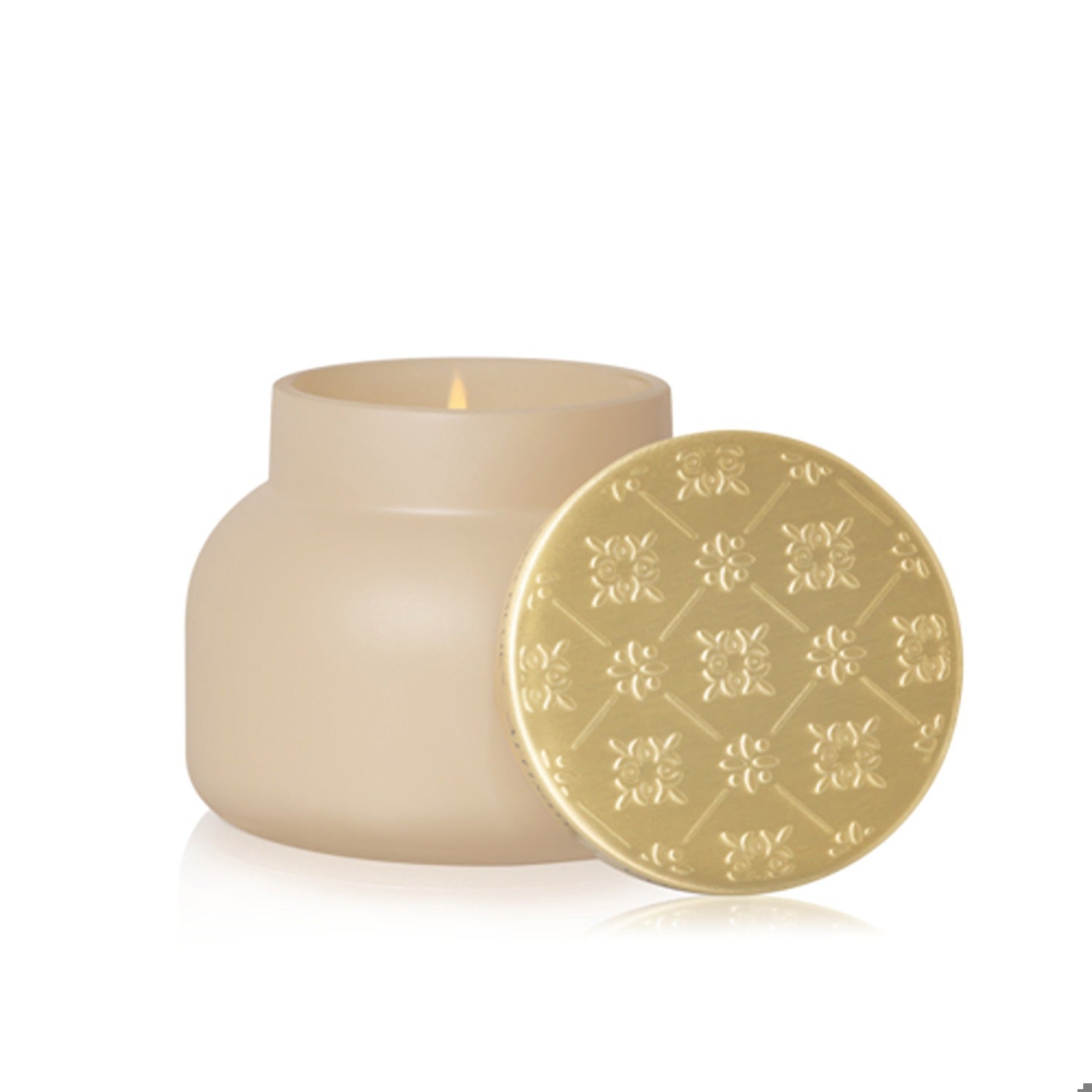 Capri Blue beige candle with a decorative gold lid on a white background. Available at Be Charmed