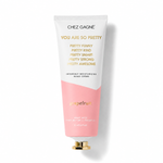 Chez Gagné 'You Are So Pretty' hand cream in a squeeze tube with a white and pink color-blocked design and gold lettering, set against a plain white background. Available at Be Charmed