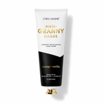 Chez Gagné Anti-Granny Hands hand cream in an orange vanilla scented tube. The squeeze tube is white on top and black on the bottom, with gold lettering. Available at Be Charmed