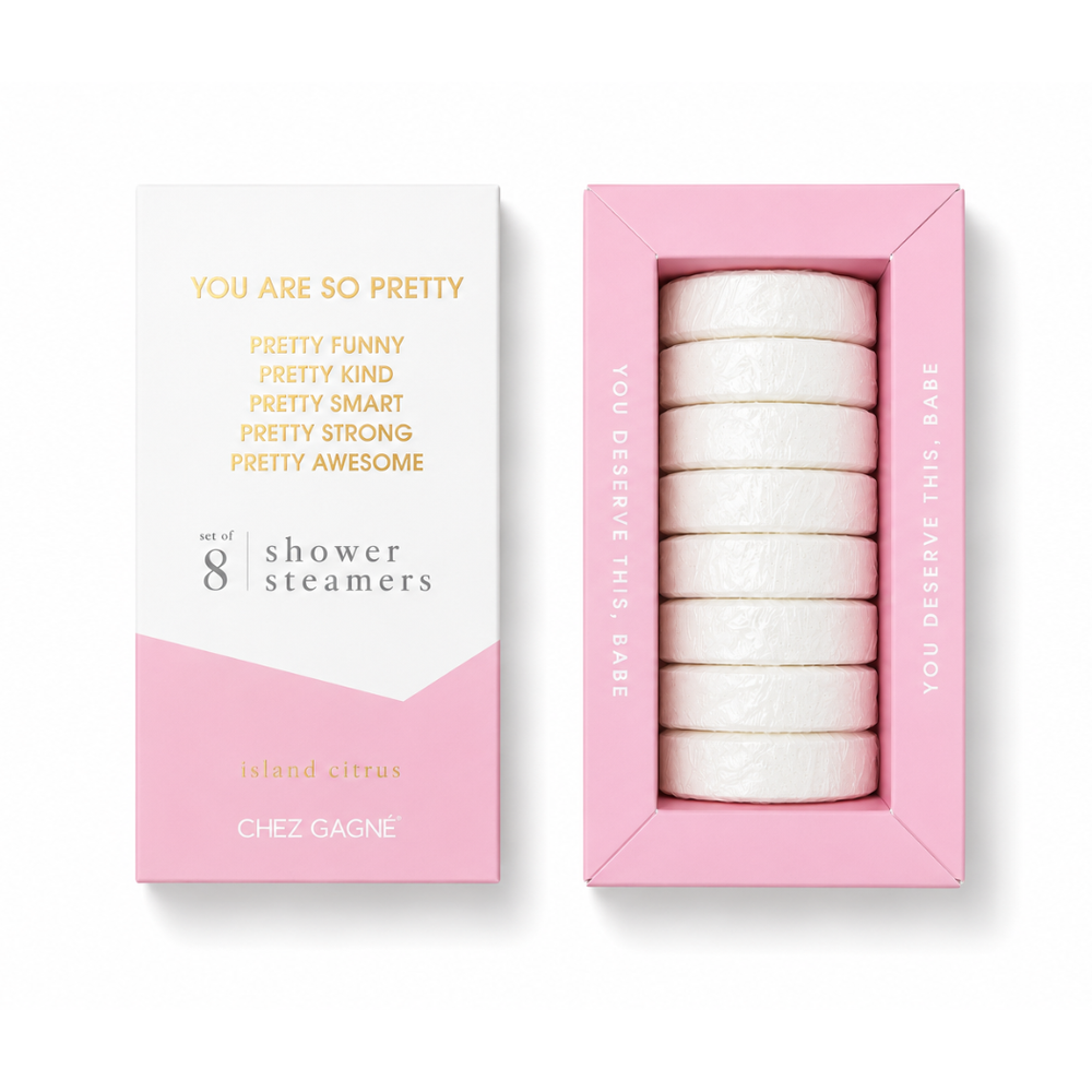 Chez Gagné You are so Pretty set of 8 shower steamers in a pink box, shown next to the outer packaging on a white background. Available at Be Charmed