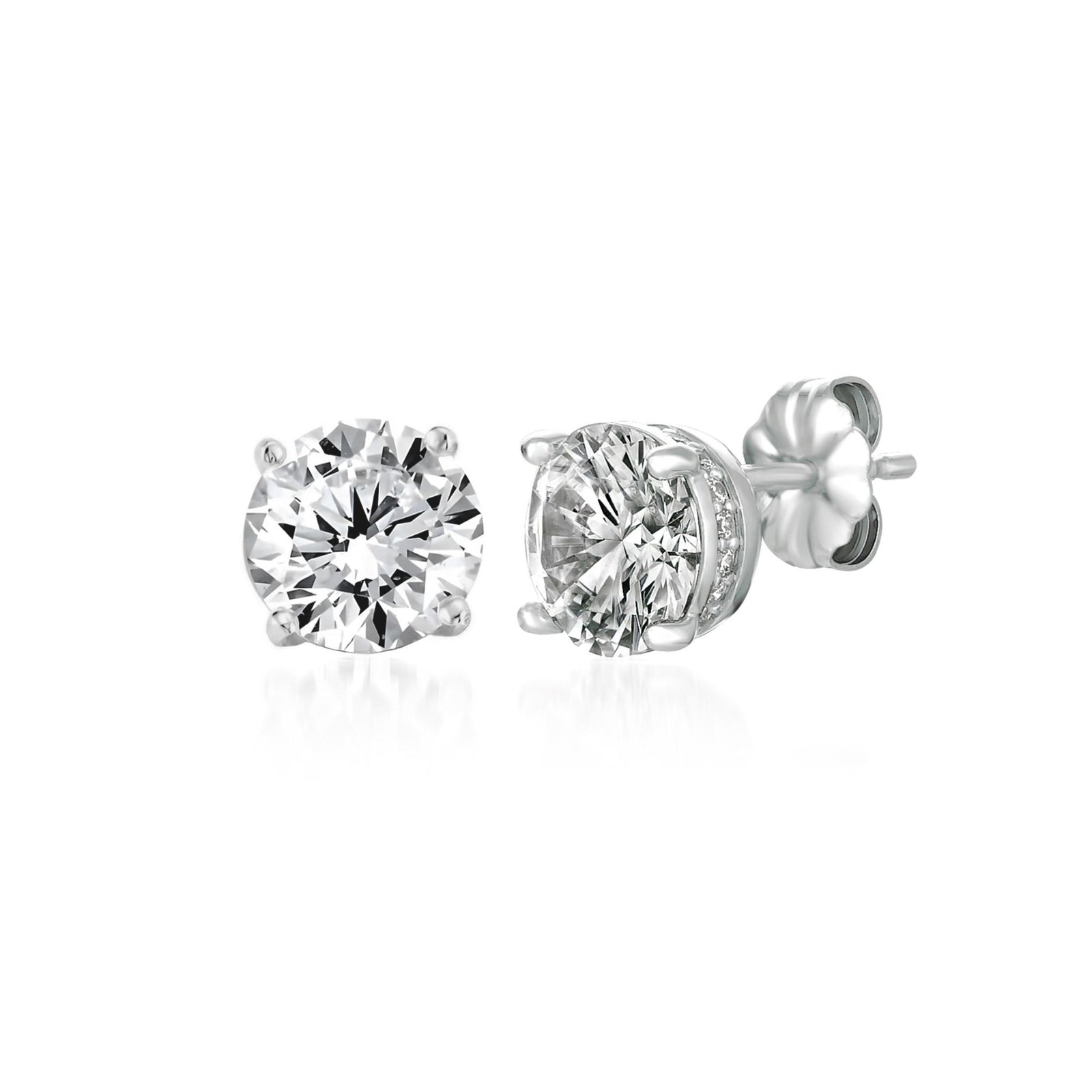 Pair of diamond stud earrings on a white background. Available at Be Charmed