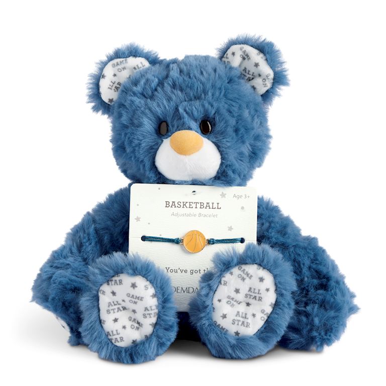 Demdaco Plush teddy bear with a basketball-themed bracelet on a white background. Available at Be Charmed