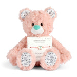 Demdaco Plush teddy bear with a gymnastics-themed bracelet on a white background. Available at Be Charmed