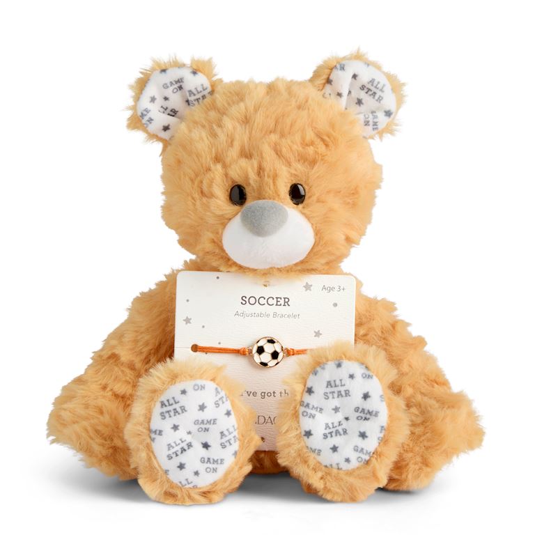 Demdaco Plush teddy bear with a soccer-themed bracelet on a white background. Available at Be Charmed