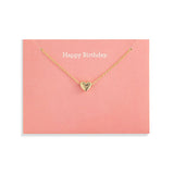 Demdaco Gold heart necklace on a pink card with 'Happy Birthday' text. Available at Be Charmed