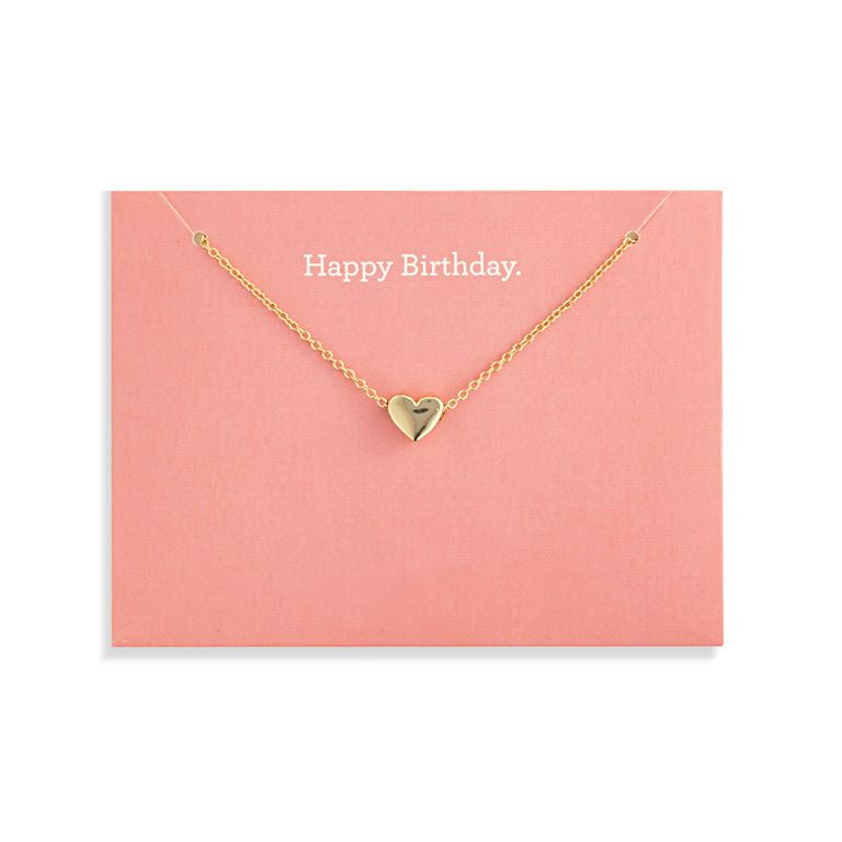 Demdaco Gold heart necklace on a pink card with 'Happy Birthday' text. Available at Be Charmed