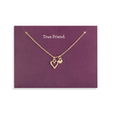 Demdaco Gold necklace with heart pendant on a 'True Friend' card. Available at Be Charmed