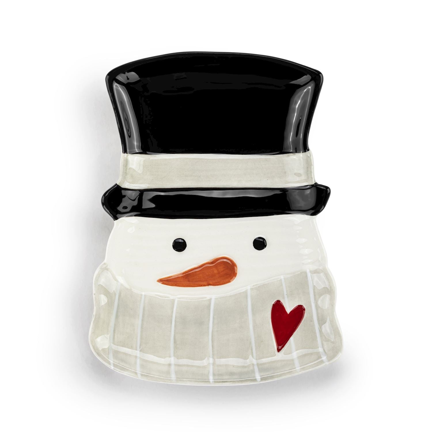 A Demdaco ceramic snowman spoonrest with a glossy black top hat, white face and scarf, small black eyes, an orange carrot nose, and a red heart on the scarf, set against a plain white background. Available at Be Charmed