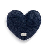 Demdaco weighted blue heart-shaped pillow on a white background. Available at Be Charmed